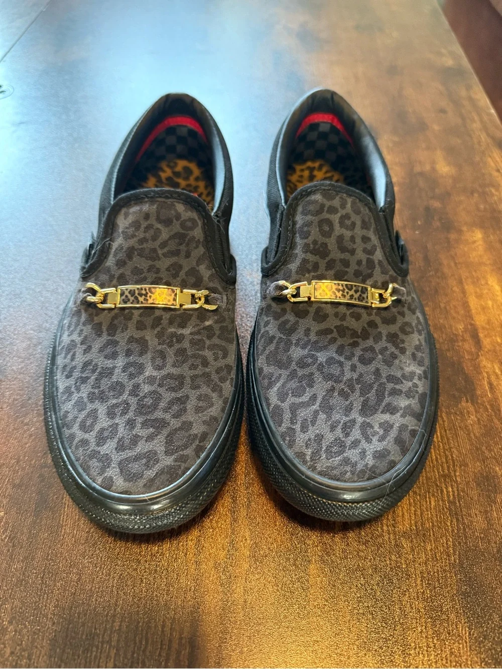 Vans Black Leopard Print Slip-On Loafers with Gold Accent